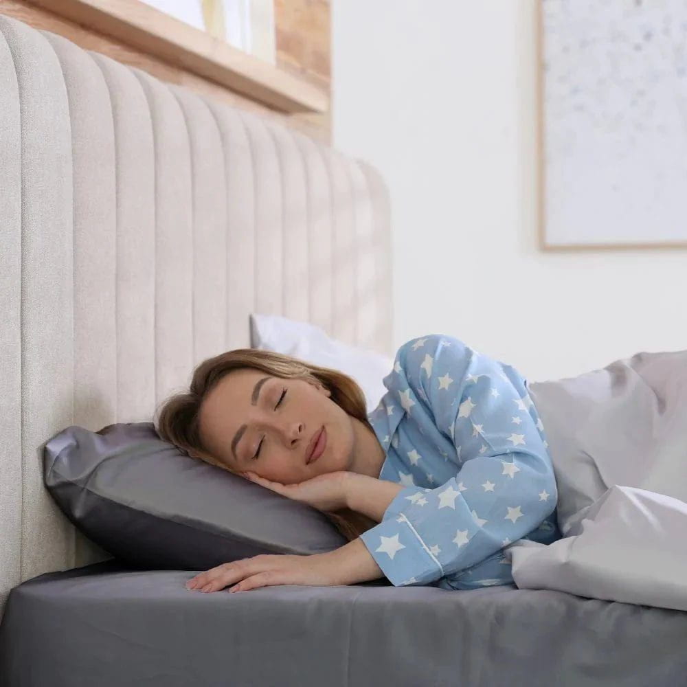 woman sleeping on sheet