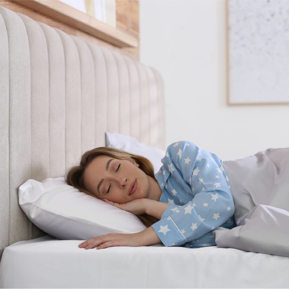 sleeping woman on sheets