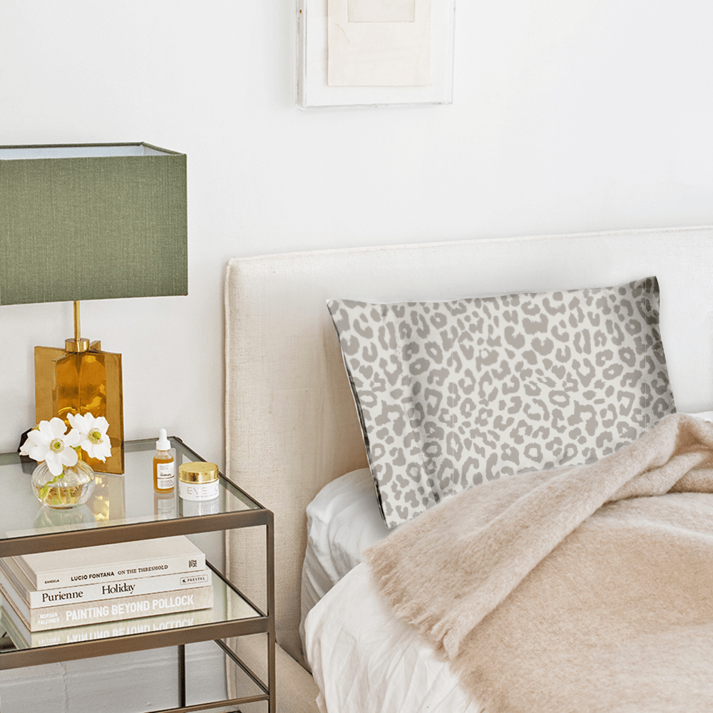 animal print pillow on bed