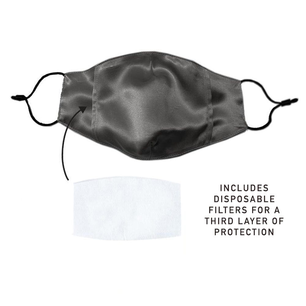 Front view of black silk face mask featuring disposable filter inside and text that reads "includes disposable filters for a third layer of protection"