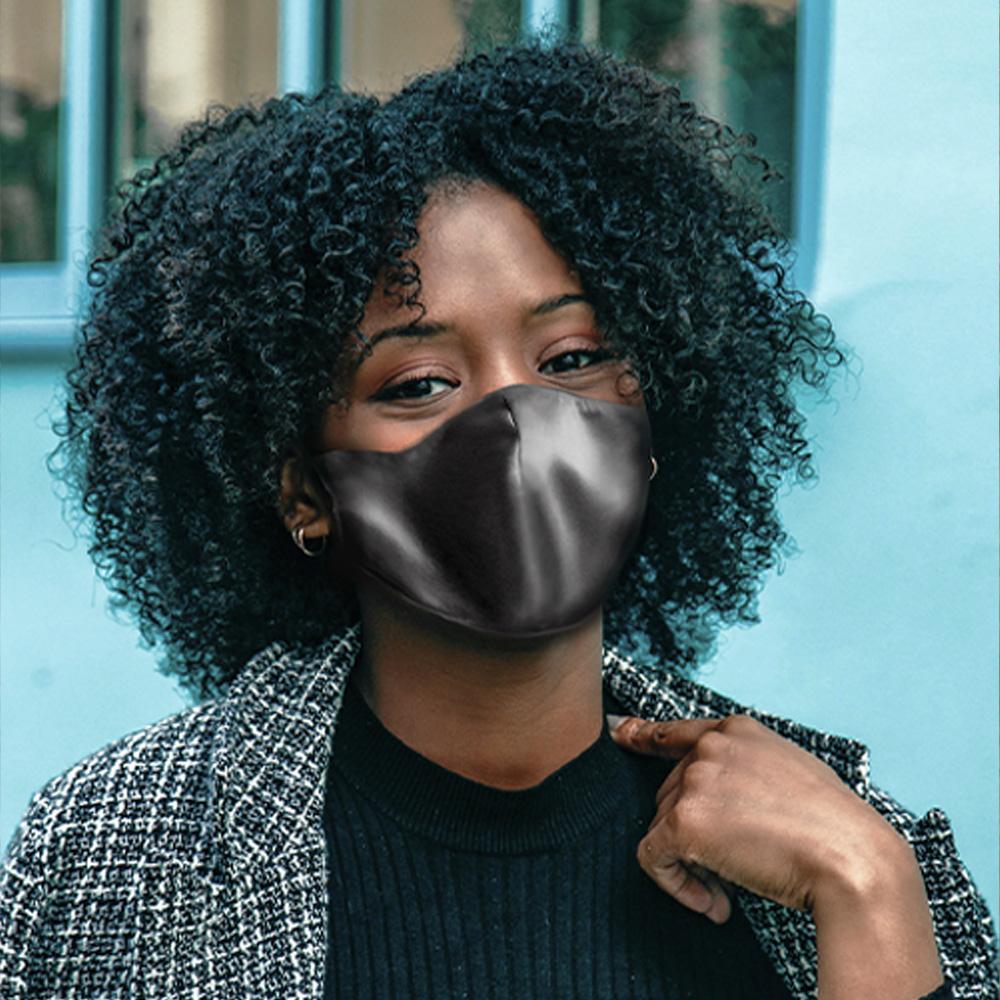 woman wearing satin face mask in gunmetal 